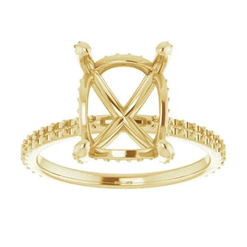 Gold engagement ring setting with X-shaped center stone holder and hidden halo diamond band.
