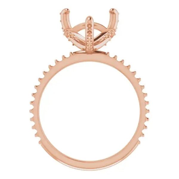 Rose gold engagement ring setting with hidden halo design and heart-shaped stone holder, shown from above.