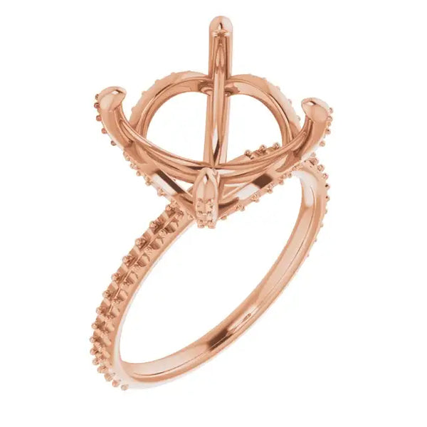 Rose gold engagement ring setting with hidden halo design and accent stones along the band.