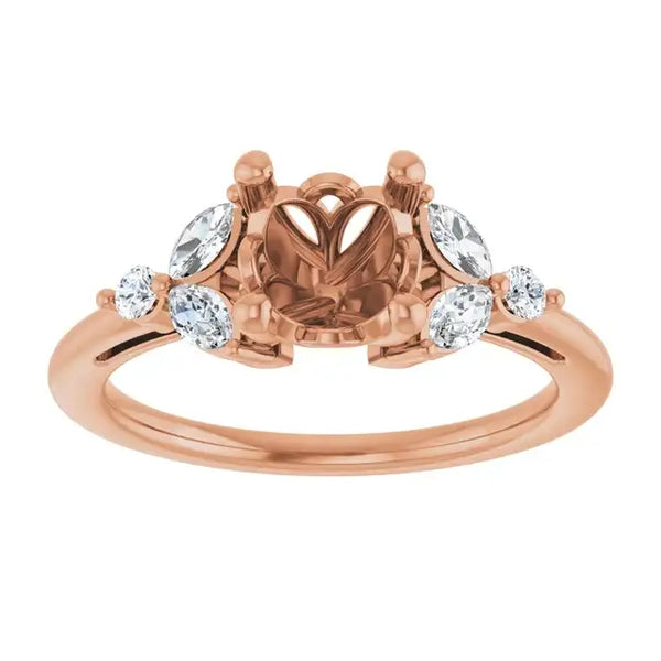 Rose gold engagement ring setting with empty cushion stone center and four accent diamonds on either side.