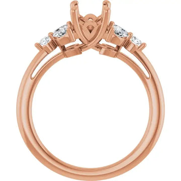 Rose gold engagement ring setting with heart-shaped center stone mount and oval diamond accents on shoulders.