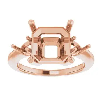 Rose gold engagement ring setting with asscher-cut stone mount and ornate side details.