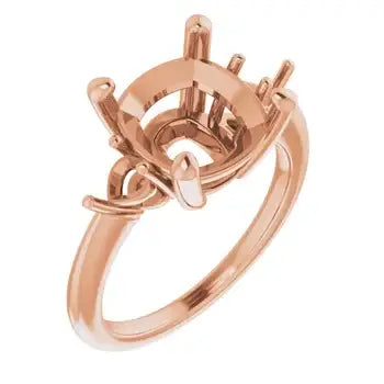Rose gold engagement ring setting with cushion stone center mount and curved side accent prongs.