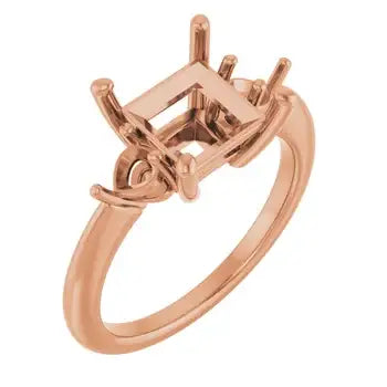 Rose gold engagement ring setting with square stone head and decorative side accents.