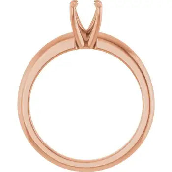 Rose gold solitaire engagement ring setting with V-shaped prongs for round stones, shown from above.
