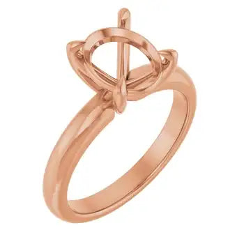 Rose gold solitaire engagement ring setting with oval stone holder and decorative prongs.