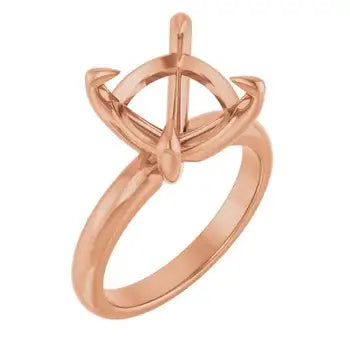 Rose gold solitaire engagement ring setting with cushion-cut stone holder and curved side details.