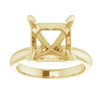 Gold solitaire engagement ring setting with four-prong head designed for asscher cut stones.
