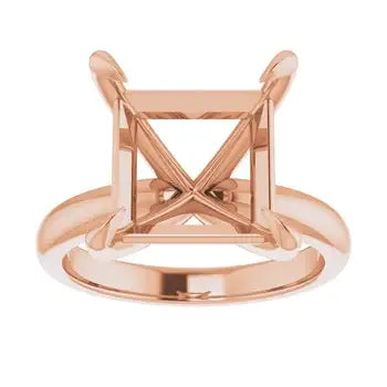 Rose gold solitaire engagement ring setting with square stone holder and crossover band detail.
