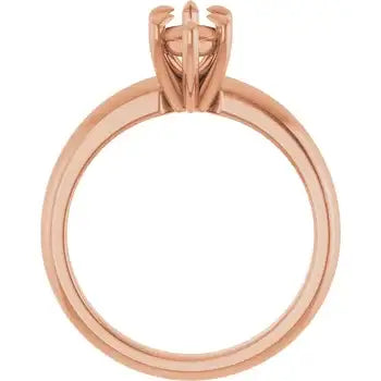 Rose gold solitaire engagement ring setting with four-prong head for marquise-cut stone.