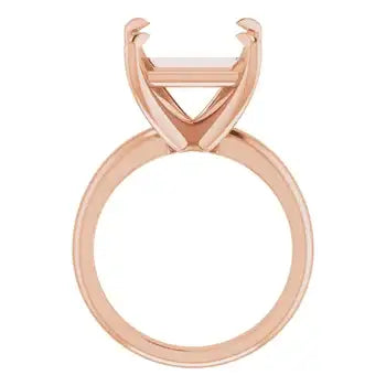 Rose gold solitaire engagement ring setting with square stone mounting and polished band.