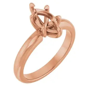 Rose gold solitaire engagement ring setting with marquise-cut stone holder and tapered band.