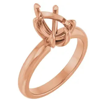 Rose gold solitaire engagement ring setting with pear-shaped stone holder and curved band.