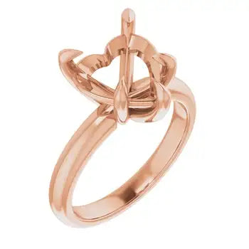 Rose gold solitaire engagement ring setting with ornate twisted band and empty heart-shaped stone mount.