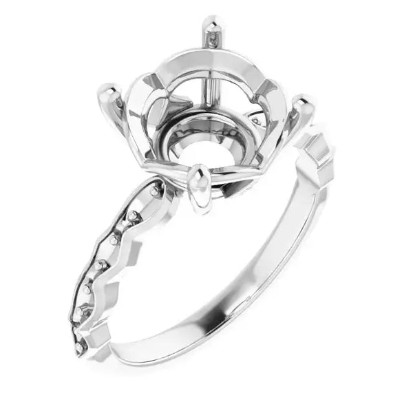 White gold engagement ring setting with French-set accent stones and crown-shaped head for round stones.