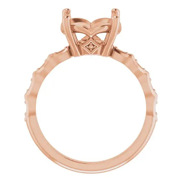 Rose gold engagement ring setting with French-set accent diamonds on band and ornate four-prong head for round stone.