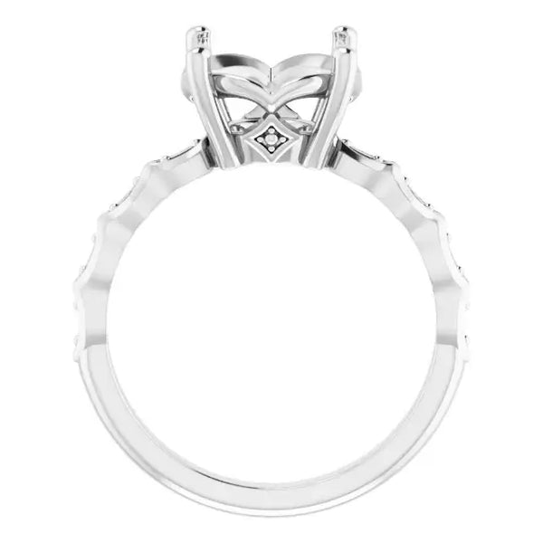 Silver engagement ring setting with ornate four-prong head and diamond accents along the band.