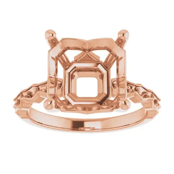 Rose gold engagement ring setting with French-set sides, octagonal stone holder, and decorative prongs.