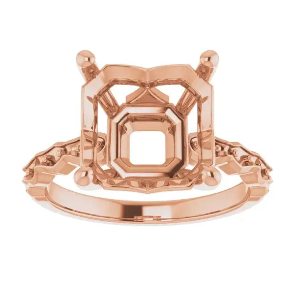 Rose gold engagement ring setting with French-set sides, octagonal stone holder, and decorative prongs.