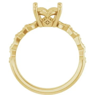 Yellow gold engagement ring setting with oval stone holder and textured band sides.