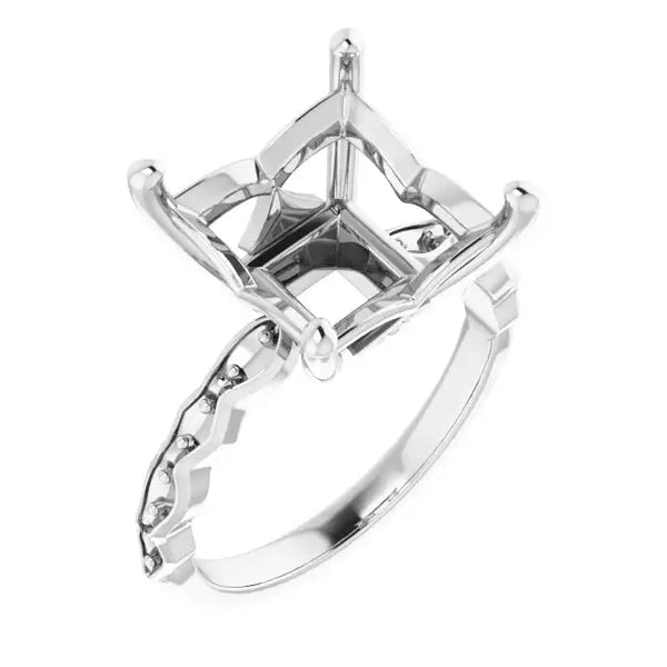 White gold engagement ring setting with square cushion-shaped center stone mount and accent stones along the band.