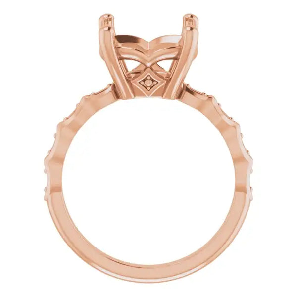 Rose gold engagement ring setting with cushion stone holder, decorative band, and small accent stones.