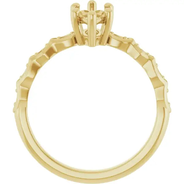 Gold engagement ring setting with French-set stones along the band and open marquise-shaped center prong setting.