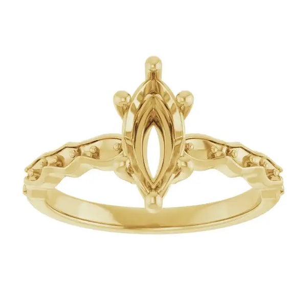 Gold engagement ring setting with oval center stone holder and decorative side accents.
