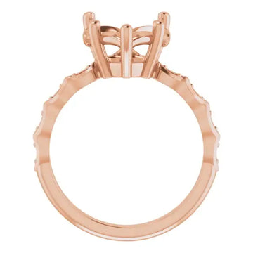 Rose gold engagement ring setting with geometric heart-shaped stone holder and accent stones along band.