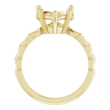 Yellow gold engagement ring setting with open four-prong head for heart-shaped stone and accent diamonds on band.