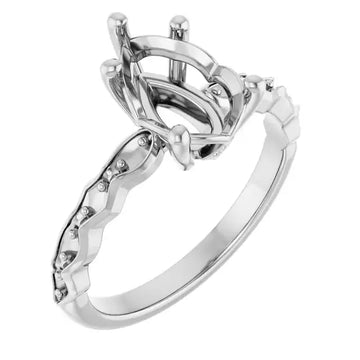 White metal engagement ring setting with pear-shaped stone head and diamond-accented curved band.