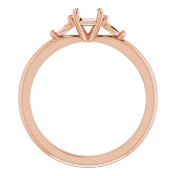 Rose gold engagement ring setting with square stone holder and four prong design, shown from above.