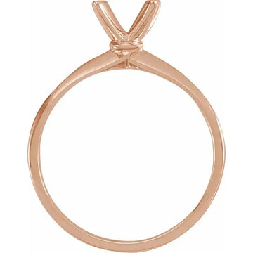 Rose gold engagement ring setting with V-shaped prongs for round stone, shown without center diamond.