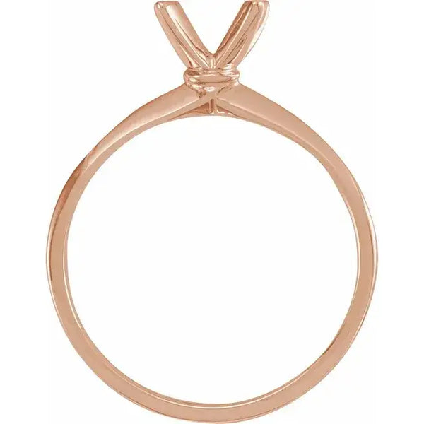Rose gold engagement ring setting with V-shaped prongs for round stone, shown without center diamond.