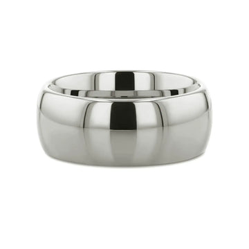 Side view of the polished white tungsten domed band lying flat