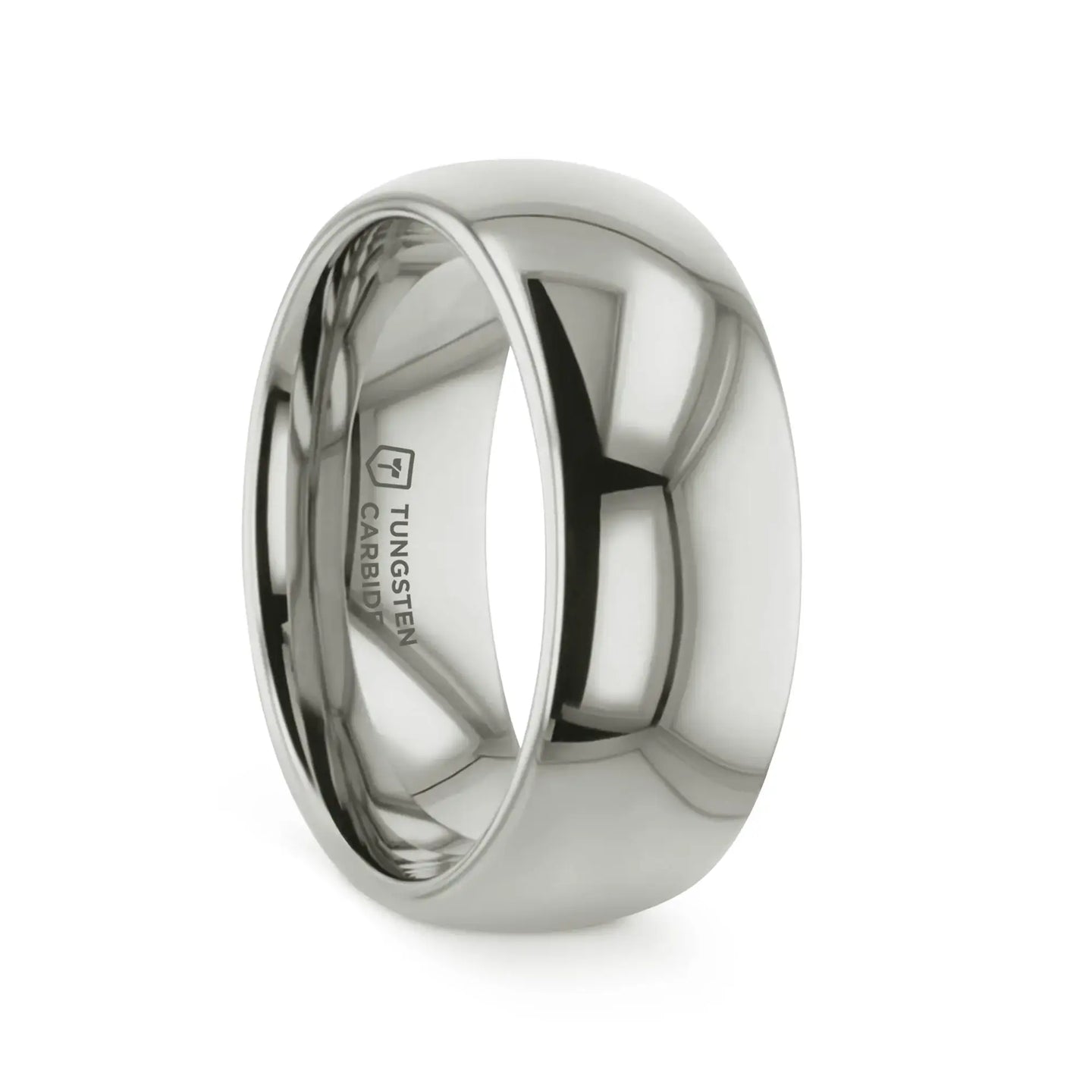 Angled view of a domed white tungsten carbide wedding band with polished finish showing interior engraving