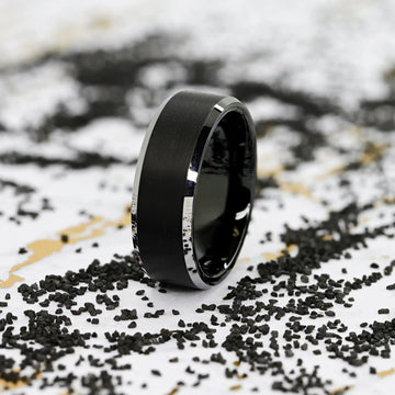 Detail image of black brushed-center tungsten ring beveled edge finish
