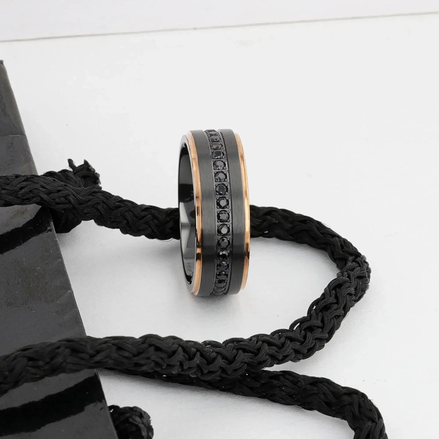 ASTRO Flat Brushed Black Titanium Ring with Rose Gold Plated Edge and Black Sapphire Settings All Around - 8mm - Larson Jewelers