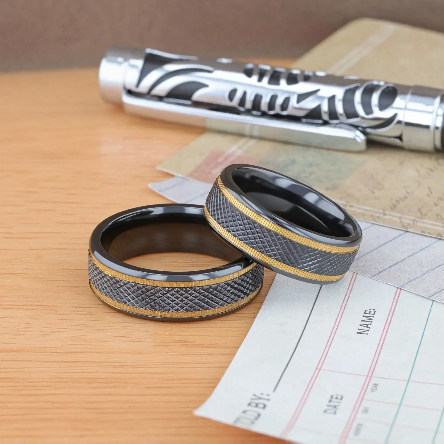 BAROQUE Black Titanium Diamond Pattern Brushed Finish Men’s Wedding Ring with Gold Milgrain Grooves – 8mm - Larson Jewelers