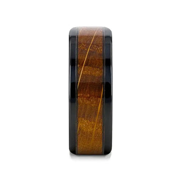 Front view showing the domed profile of the ring with the whiskey barrel wood inlay centered between glossy black zirconium edges.