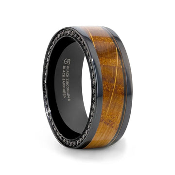 Angled side view of an 8mm black zirconium ring featuring a polished whiskey barrel wood inlay and a rim of small black sapphires.
