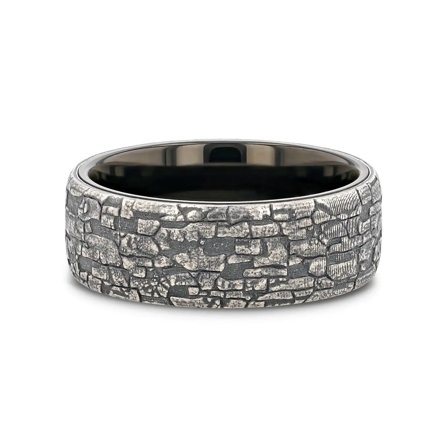 Flat lay view highlighting the ring’s black tungsten interior and antique silver stonework exterior