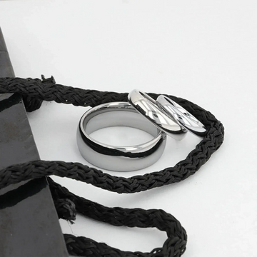 DOMINUS domed tungsten carbide ring, isolated side view on white background