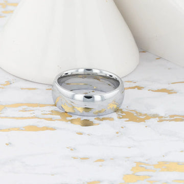 DOMINUS domed tungsten carbide ring, isolated angled view on white background
