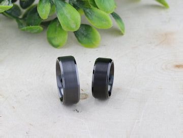 Top-down view of full ring band with uniform brushed center finish, 8mm