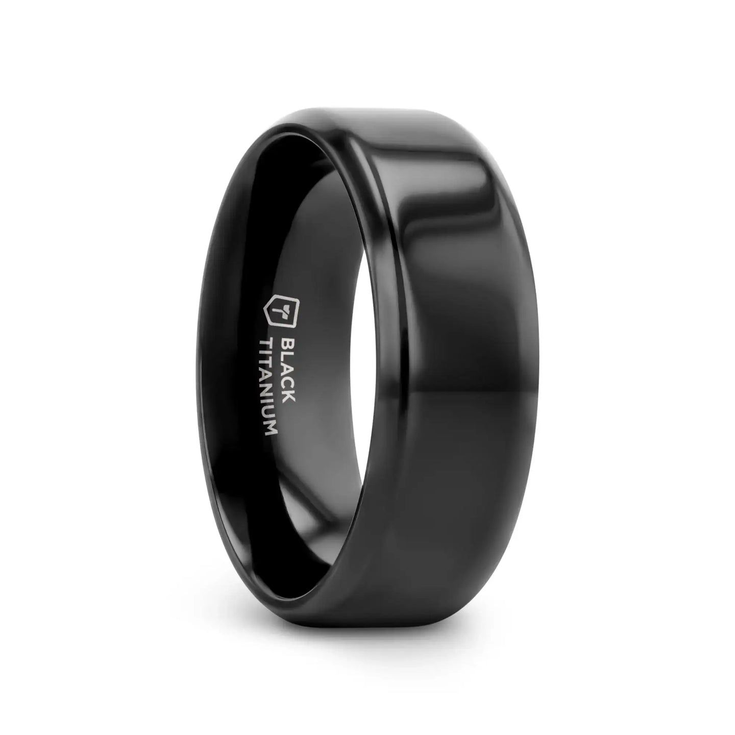 Black titanium wedding band with polished beveled edges, 8mm width, angled three-quarter view showing interior engraving that reads “Black Titanium.”