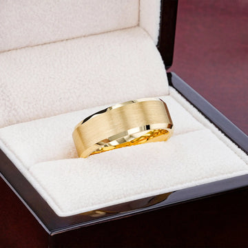 Man in suit wearing the gold-plated tungsten ring, emphasizing its brushed center and polished edges.