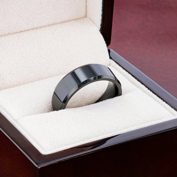 Close-up studio image emphasizing the beveled edge detail of the INFINITY black tungsten ring