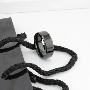 Graphic render of the INFINITY black tungsten ring illustrating beveled edges and comfort-fit interior