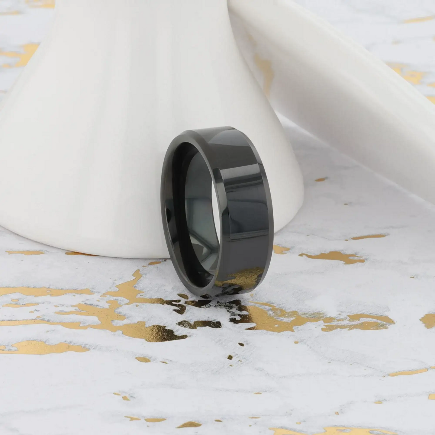 Graphic render angled view of the INFINITY black tungsten ring highlighting width options and beveled edges